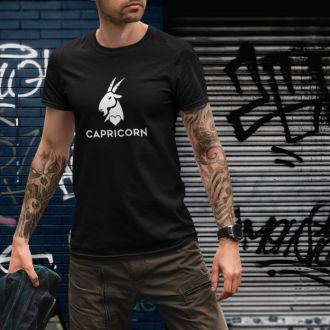 Man wearing a black Capricorn Zodiac Sign T-shirt from Yebber, featuring a minimalist goat symbol with a heart – statement clothing for astrology enthusiasts.