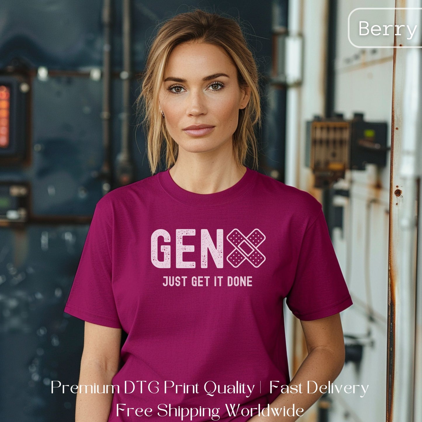 Woman wearing a berry Gen X statement clothing T-shirt with the text "Just Get It Done," standing in an industrial setting. Premium DTG print quality, fast delivery, and free worldwide shipping by Yebber.