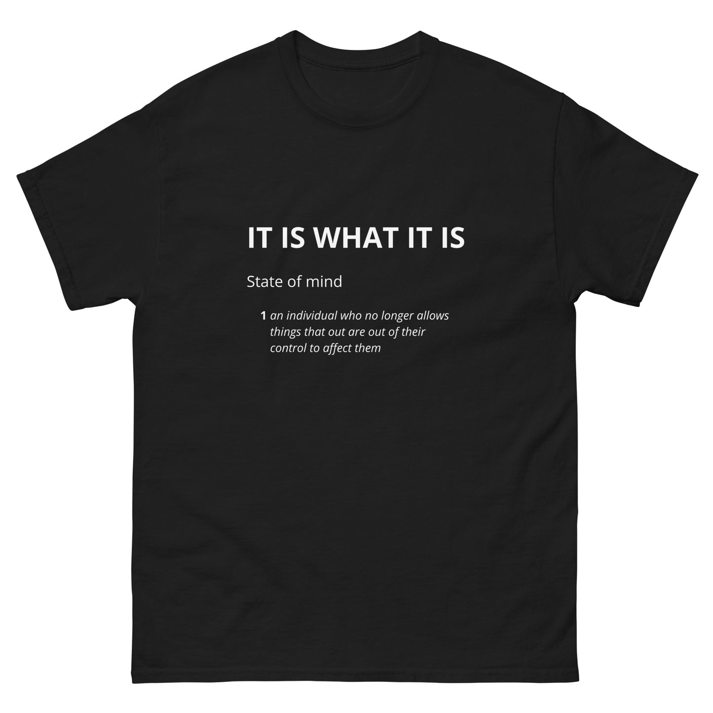Front of black IT IS WHAT IT IS T-shirt from Yebber, featuring bold typography and a dictionary-style definition—statement clothing for a carefree mindset.