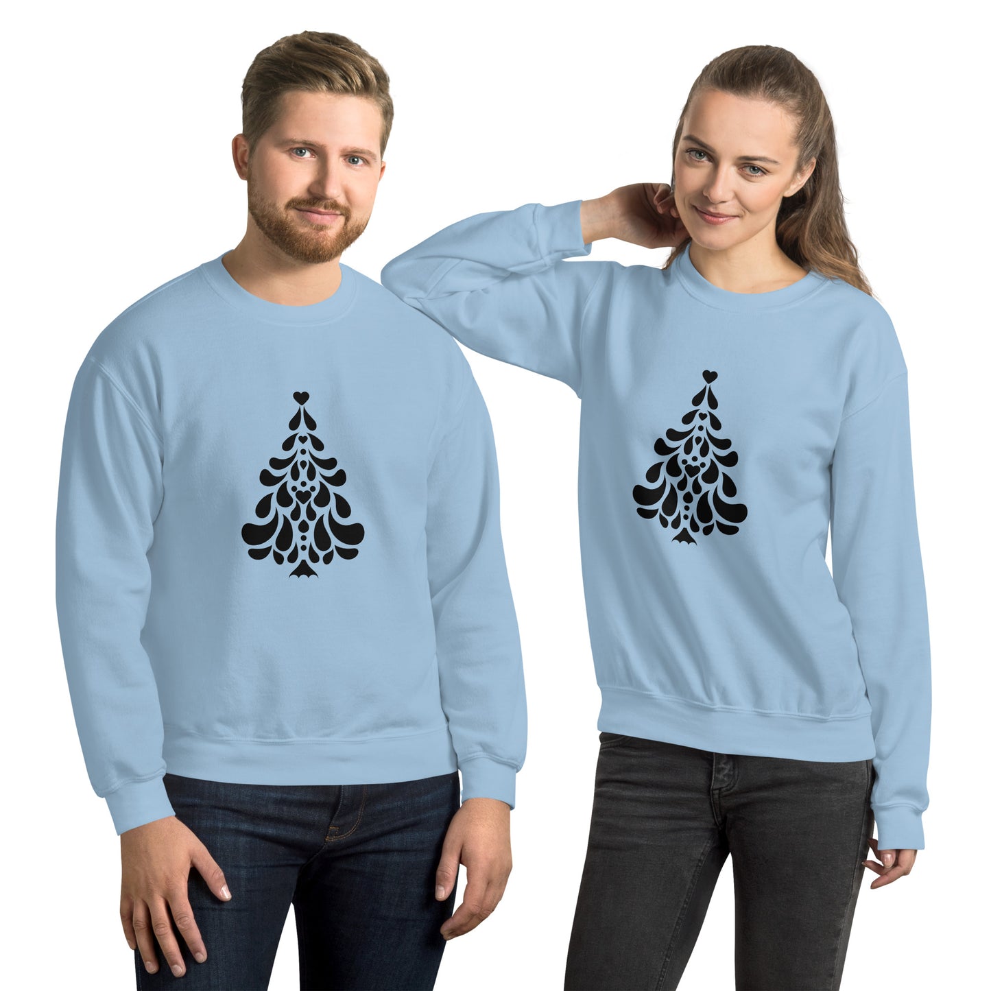 Couple wearing a Light Blue Minimalistic Christmas statement clothing sweatshirt with a black minimalist Christmas tree design.