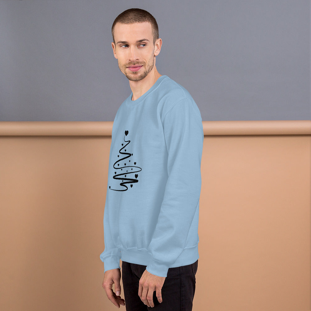 Person wearing a Light Blue Minimalistic Christmas statement clothing sweatshirt with a black abstract Christmas tree design.