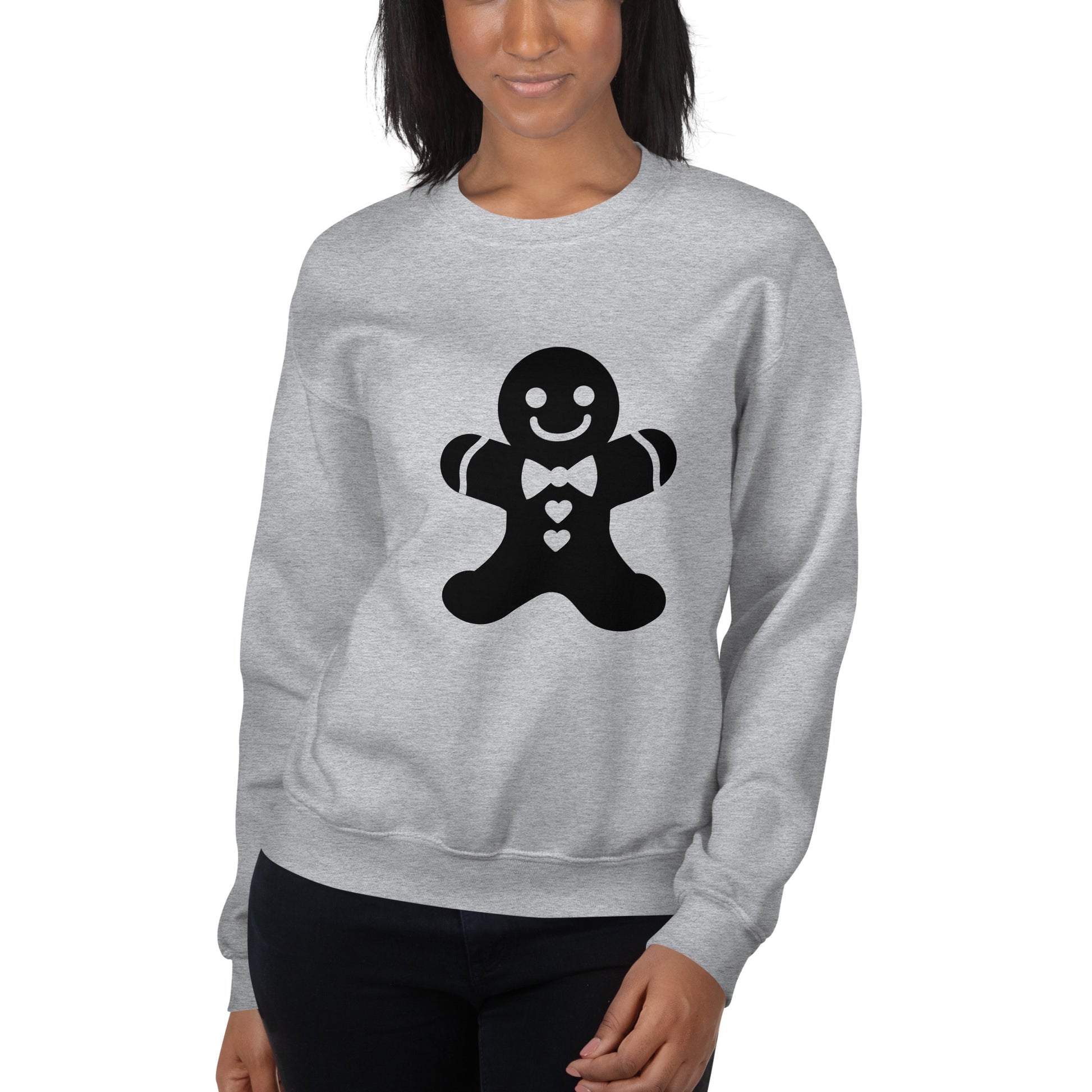 Person wearing a Sports Grey Minimalistic Christmas statement clothing sweatshirt with a black gingerbread man design.