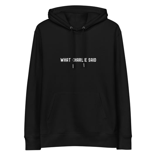 Black “What Charlie Said” hoodie by Yebber – minimalist flat lay product shot showcasing bold white typography and clean statement clothing design.
