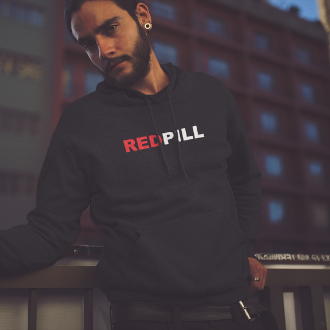 Man wearing a black Red Pill Hoodie from Yebber, featuring bold red and white typography symbolizing awakening – statement clothing for truth seekers.